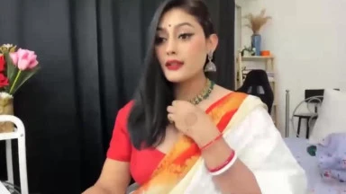 Video thumbnails for 'Annas Sexy Life in an Orange Sari A Must-See Video' depicting anna goddess, indian webcam model, webcam whore, anna aunty, anna lovense video